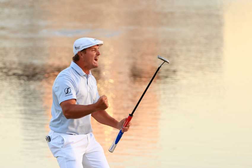 ORLANDO, FLORIDA - MARCH 07: Bryson DeChambeau of the United States celebrates making his putt on the 18th green to win during the final round of the Arnold Palmer Invitational Presented by MasterCard at the Bay Hill Club and Lodge on March 07, 2021 in Orlando, Florida. (Photo by Mike Ehrmann/Getty Images)
